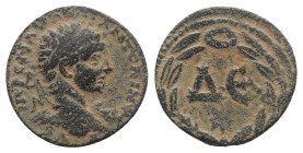 Elagabalus (218-222). Seleucis and Pieria, Antioch. Æ (20mm, 7.26g, 6h). Laureate head r. R/ Large ΔЄ, star below; all within laurel wreath. McAlee 80...