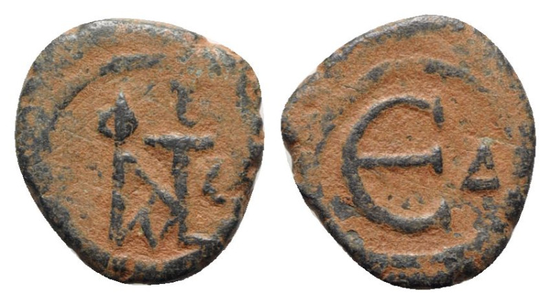 Justin II (565-578). Æ 5 Nummi (17mm, 2.85g, 12h). Constantinople. Monogram. R/ ...