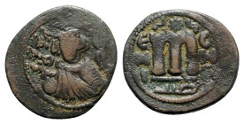 Islamic, Arab-Byzantine, Umayyad Caliphate. temp. 'Abd al-Malik ibn Marwan (AH 65-86 / AD 685-705). Æ Fals (21.5mm, 4.27g, 7h). Hims (Emesa), c. 685-6...