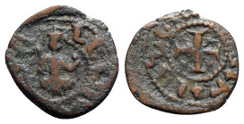 Cilician Armenia, Levon III (1301-1307). Æ Kardez (20mm, 3.37g). Levon seated facing in oriental fashion, holding cross and staff. R/ Cross potent. Cf...
