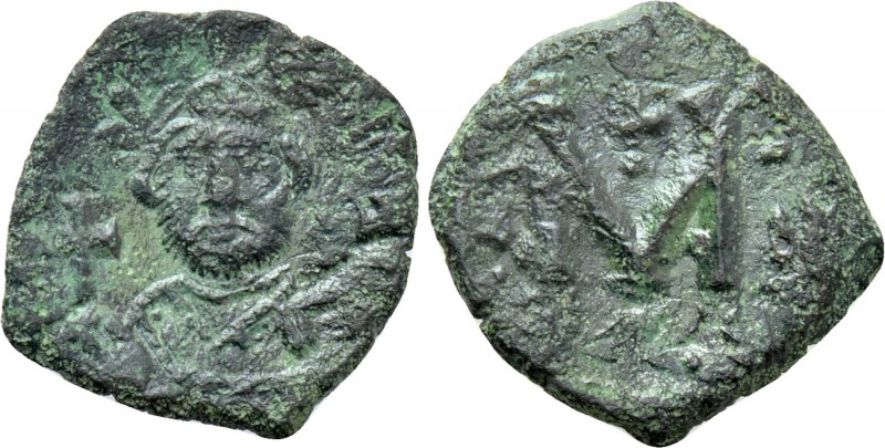 LEONTINUS (695-698). Follis. Constantinople. 

Obv: Crowned bust facing, holdi...