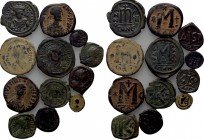 12 Byzantine Coins of Justinian and Tiberius Constantine.