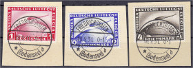 1 M, 2 RM+4 RM Flugpostmarke 1928/31, drei gestempelte Werte auf Briefstück in Luxuserhaltung, entwertet ,,FRIEDRICHSHAFEN 18.9.31" Mi. 155,-€. gestem...