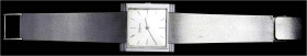 Uhren aus Gold - Armbanduhren - 
Damen-Armbanduhr DELANEAU Weissgold 750/1000 mit Armband. Länge 14,8 cm, Lunette 28 mm. Handaufzug. 59,36 g. Zifferb...