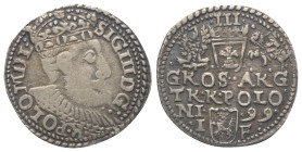 Polen. Königreich. Sigismund III. Wasa (1587 - 1632).

 Dreigröscher (Silber). 1599. Ilkenau (Olkusz).
Vs: Gekrönter Kopf mit Harnisch- und Mühlste...