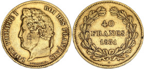 FRANCE
Louis-Philippe Ier (1830-1848). 40 francs tête laurée 1831, A, Paris. G.1106 - F.546 - Fr.557 ; Or - 12,84 g - 26 mm - 6 h
TTB.