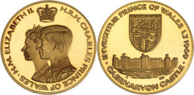 GRANDE-BRETAGNE
Élisabeth II (1952-2022). Médaille d’or commémorant l’investiture du Prince Charles au Château de Caernarfon 1969. Or - 30,02 g - 34 m...