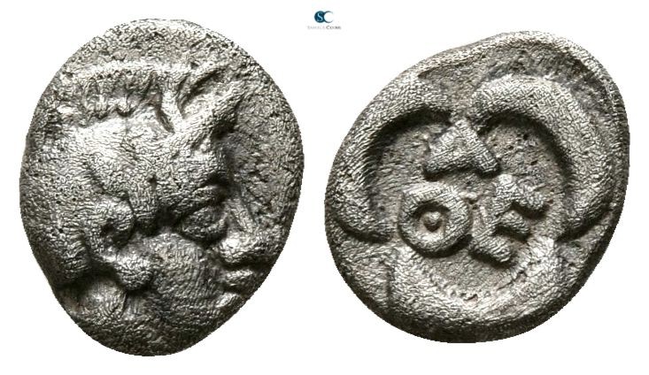 Attica. Athens circa 454-404 BC. 
Tritartemorion AR

7mm., 0,48g.

Helmeted...