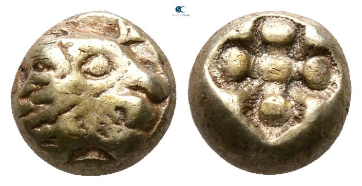 Ionia. Miletos 600-550 BC. 
Hemihekte EL

6mm., 1,17g.

Head of lion right ...