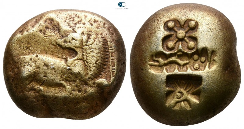 Ionia. Miletos before 575 BC.
Stater EL

18mm., 13,81g.

Lion reclining rig...
