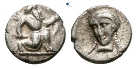 Achaemenid Empire. Uncertain mint. Time of Artaxerxes II to Darios III circa 400 BC. Tetartemorion AR