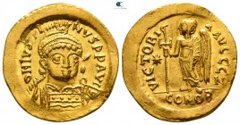Justin I AD 518-527. Struck circa AD 518-522. Constantinople. 7th officina. Solidus AV