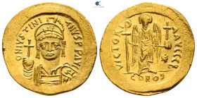 Justinian I AD 527-565. Struck AD 545-565. Constantinople. 2nd officina. Solidus AV