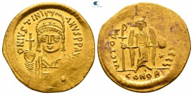 Justinian I AD 527-565. Struck circa AD 545-565. Constantinople. 6th officina. Solidus AV