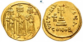 Heraclius, with Heraclius Constantine and Heraclonas AD 610-641. Struck AD 638/9-641. Constantinople. 1st officina. Solidus AV