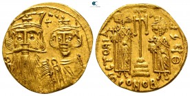 Constans II, with Constantine IV, Heraclius, and Tiberius AD 641-668. Struck AD 662-667. Constantinople. 9th officina. Solidus AV
