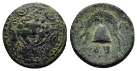 Kings of Macedon. Salamis. Philip III Arrhidaeus 323-317 BC. Bronze Æ (16mm, 4.2 g) Macedonian shield, facing gorgoneion on boss / Helmet; kerykeion t...