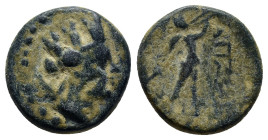 Phrygia. Apameia circa 133-48 BC. Bronze Æ (15mm, 4.0 g) Turreted head of Artemis-Tyche right, bow and quiver over shoulder / AΠAME Marsyas with doubl...