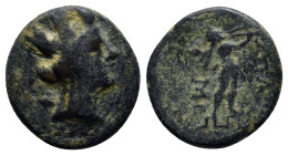 PHRYGIA. Apameia AE Ca. 88-48 BC. (15mm, 3.7 g) Bust of Tyche right. Obv: AΠAME Nude Marsyas striding to right on meander pattern, playing double-flut...