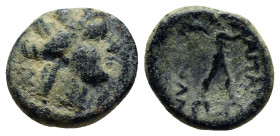 PHRYGIA. Apameia AE Ca. 88-48 BC. (14mm, 2.9 g) Bust of Tyche right. Obv: AΠAME Nude Marsyas striding to right on meander pattern, playing double-flut...