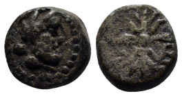 PISIDIA. Selge. Ae (12mm, 2.5 g) (2nd-1st centuries BC). Obv: Head of Herakles right, with club over shoulder. Rev: Σ - Ε - Λ. Thunderbolt and arc ter...
