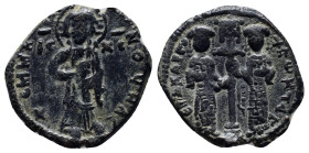 Constantine X. 1059-1067. Æ follis. (25mm, 6.0 g). Christ standing facing on footstool, holding book of Gospels / Eudocia on left and Constantine on r...