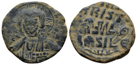 Anonymous. Circa 976-1030/35. Ae Follis (25mm, 7.4 g) Facing bust of Christ, raising hand in benediction, holding Gospels; nimbus with five pellets in...