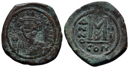 Maurice Tiberius (582-602). Æ 40 Nummi (30mm, 12.3 g). Constantinople, year 3 (584/5). Helmeted and cuirassed bust facing, holding globus cruciger. R/...