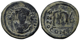 Tiberius II Constantine AD 578-582, (dated RY 7=AD 580/1).. Constantinople Follis Æ (29mm, 12.4 g). Crowned facing bust, wearing consular robes, holdi...