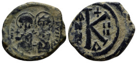 Justin II AD 565-578. Constantinople Half follis Æ (20mm, 7.1 g). D N IVSTINVS PP AV, Justin II and Sophia seated on throne facing, both nimbate; he h...