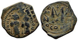 Heraclius with Heraclius Constantine AD 610-641. Constantinople Follis Æ (24mm, 7.3 g). Heraclius, on left, and Heraclius Constantine, on right, stand...