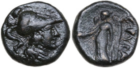 Italy, Southern Apulia, Rubi, c. 300-222 BC. Æ (11,5 mm, 2 g). Head of Athena left, wearing crested Corinthian helmet. R/ Nike l. holding patera and p...