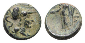 Italy, Southern Apulia, Rubi, c. 300-222 BC. Æ (12mm, 1.67g, 12h). Head of Athena l., wearing crested Corinthian helmet. R/ Nike l. holding patera and...