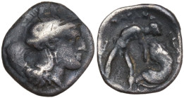 Italy, Calabria. Tarentum. c. 380-280 BC. AR diobol (10,8 mm, 0,9 g). Head of Athena right, wearing crested Attic helmet decorated with hippocamp. R/ ...