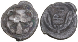 Italy, Bruttium. Rhegium. Ca. late 5th-early 4th century BC. AR litra (10 mm, 0.7 g). Facing lion scalp; dotted border. R/ PH, olive sprig with berrie...