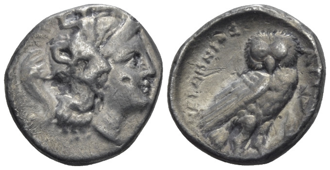 Calabria, Tarentum Drachm circa 280-272, AR 15.00 mm., 3.10 g.
Head of Athena r...