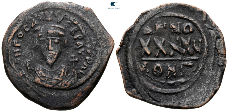 Phocas AD 602-610. Constantinople
Follis or 40 Nummi Æ

35 mm, 11,20 g


...