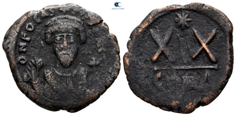 Phocas AD 602-610. Constantinople
Half Follis or 20 Nummi Æ

26 mm, 5,49 g
...