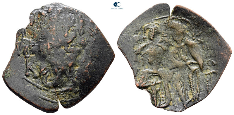 Michael VIII Palaeologus AD 1261-1282. Constantinople
Trachy Æ

23 mm, 1,58 g...