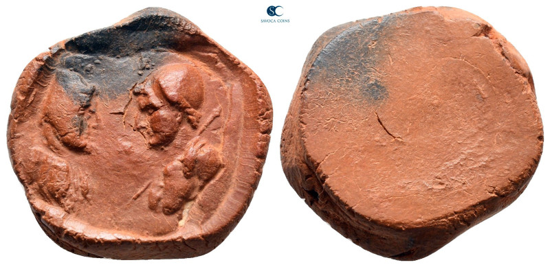 Greek
Uniface terracotta clay seal

20 mm, 2,33 g

nearly very fine