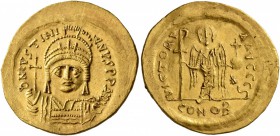 Justinian I, 527-565. Solidus (Gold, 21 mm, 4.54 g, 7 h), Constantinopolis, 545-565. D N IVSTINIANVS P P AVI Helmeted and cuirassed bust of Justinian ...