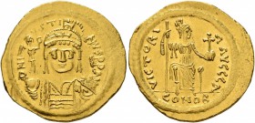 Justin II, 565-578. Solidus (Gold, 21 mm, 4.48 g, 6 h), Constantinopolis. D N IVSTINVS P P AVI Helmeted and cuirassed bust of Justin II facing, holdin...