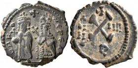 Phocas, 602-610. Dekanummium (Bronze, 17 mm, 2.35 g, 6 h), Constantinopolis, RY 4 = 605/6. O N FO NЄ PЄ AV Phocas standing facing, holding globus cruc...