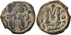 ISLAMIC, Umayyad Caliphate. temp. Mu'awiya I ibn Abi Sufyan , AH 41-60 / AD 661-680. Fals (Bronze, 18 mm, 3.72 g, 2 h), Arab-Byzantine type, Ba'albakk...