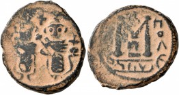 ISLAMIC, Umayyad Caliphate. temp. Mu'awiya I ibn Abi Sufyan , AH 41-60 / AD 661-680. Fals (Bronze, 21 mm, 4.86 g, 5 h), Arab-Byzantine type, Ba'albakk...