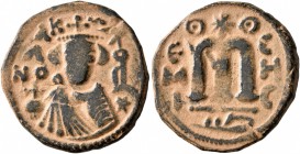 ISLAMIC, Umayyad Caliphate. temp. Mu'awiya I ibn Abi Sufyan , AH 41-60 / AD 661-680. Fals (Bronze, 20 mm, 3.09 g, 6 h), Arab-Byzantine type, Hims. K/A...