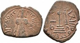 ISLAMIC, Umayyad Caliphate. temp. 'Abd al-Malik ibn Marwan , AH 65-86 / AD 685-705. Fals (Bronze, 20 mm, 2.06 g, 8 h), 'Standing Caliph' type, Qinnasr...