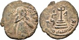 ISLAMIC, Umayyad Caliphate. temp. 'Abd al-Malik ibn Marwan , AH 65-86 / AD 685-705. Fals (Bronze, 19 mm, 2.05 g, 4 h), 'Standing Caliph' type, Halab. ...