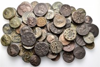 A lot containing 77 bronze coins. All: Roman Provincial. About very fine to very fine. LOT SOLD AS IS, NO RETURNS. 77 coins in lot.