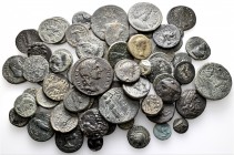 A lot containing 64 bronze coins. Includes: Greek, Roman Provincial and Roman Imperial. Fine to very fine. LOT SOLD AS IS, NO RETURNS. 64 coins in lot...